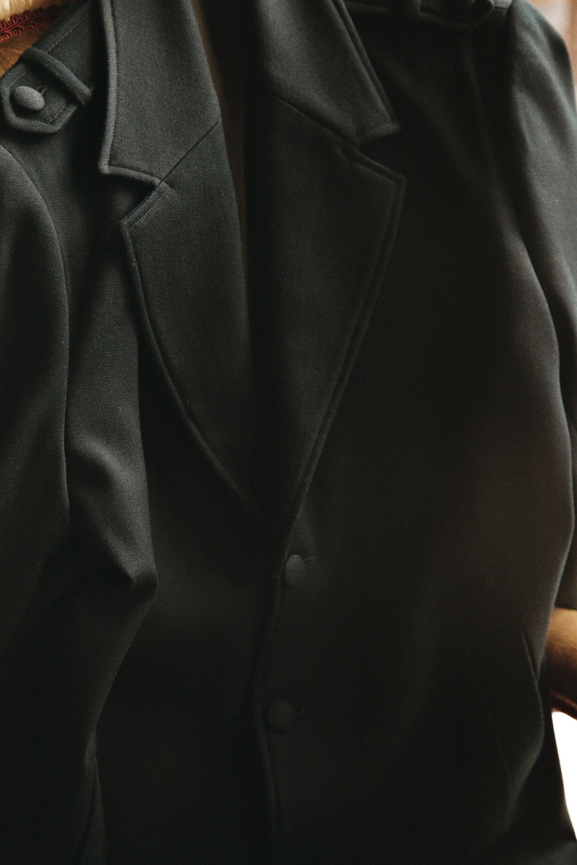 Green wool coat for men by Gorina Atelier front view detail
