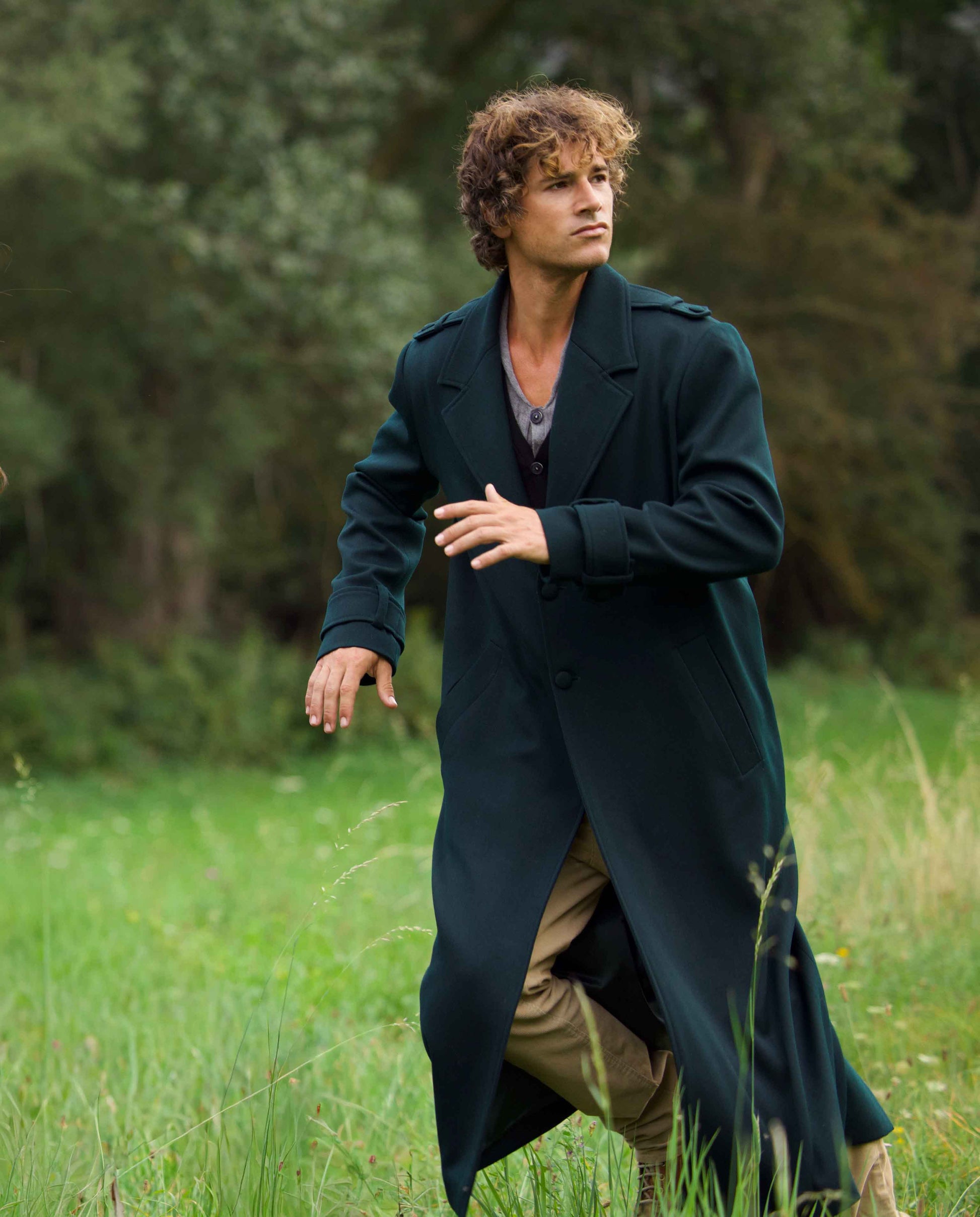 Blue green wool coat for men by Gorina Atelier front view with model 