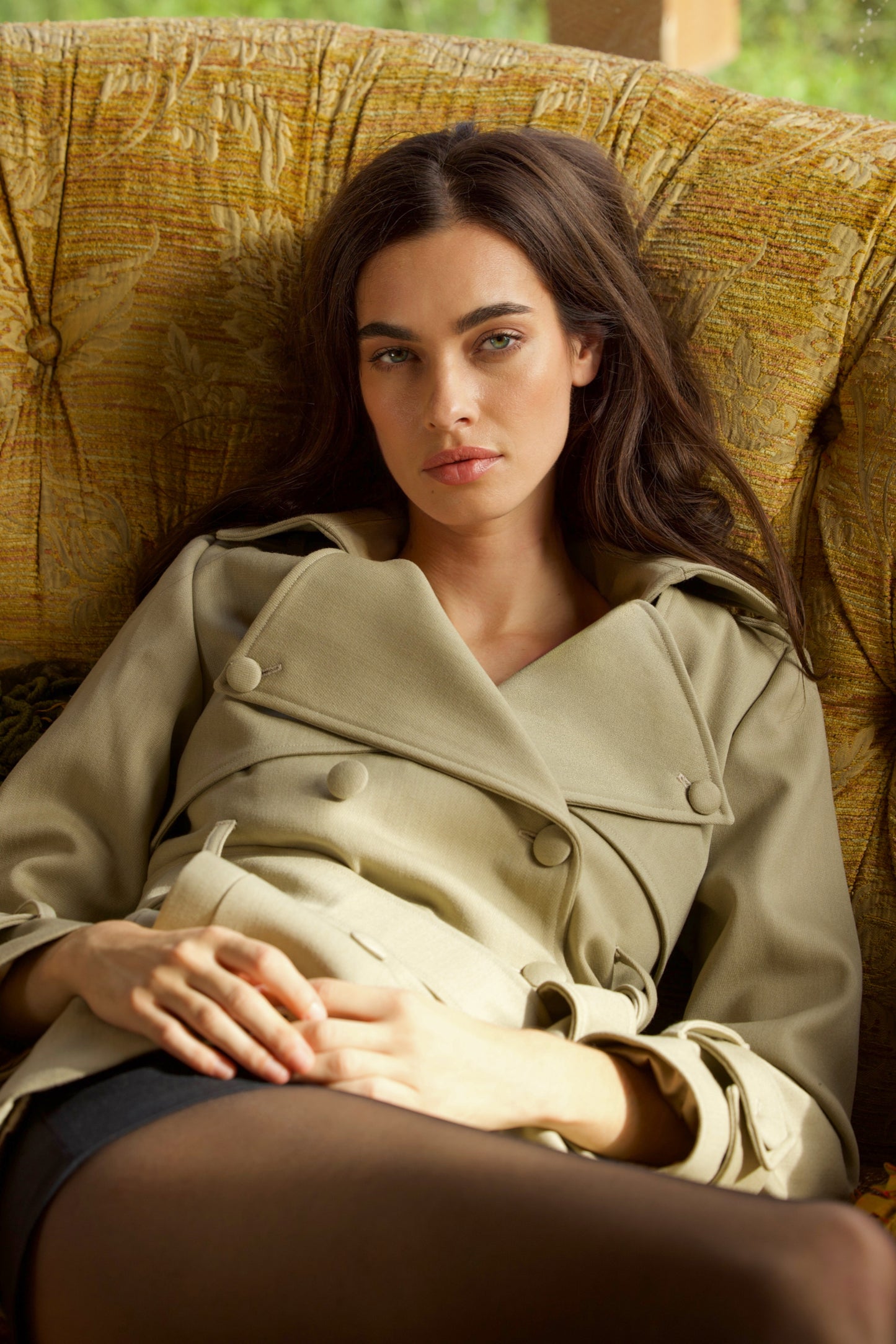 Beige short wool trench coat for women Sculpted Grace by Gorina Atelier front view close up with model