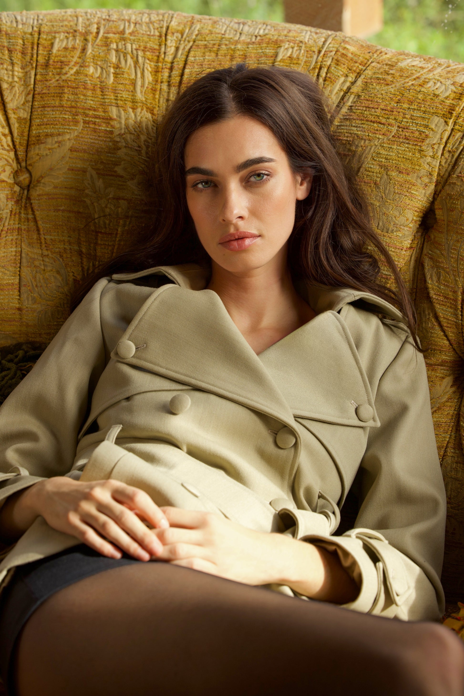 Beige short wool trench coat for women Sculpted Grace by Gorina Atelier front view close up with model