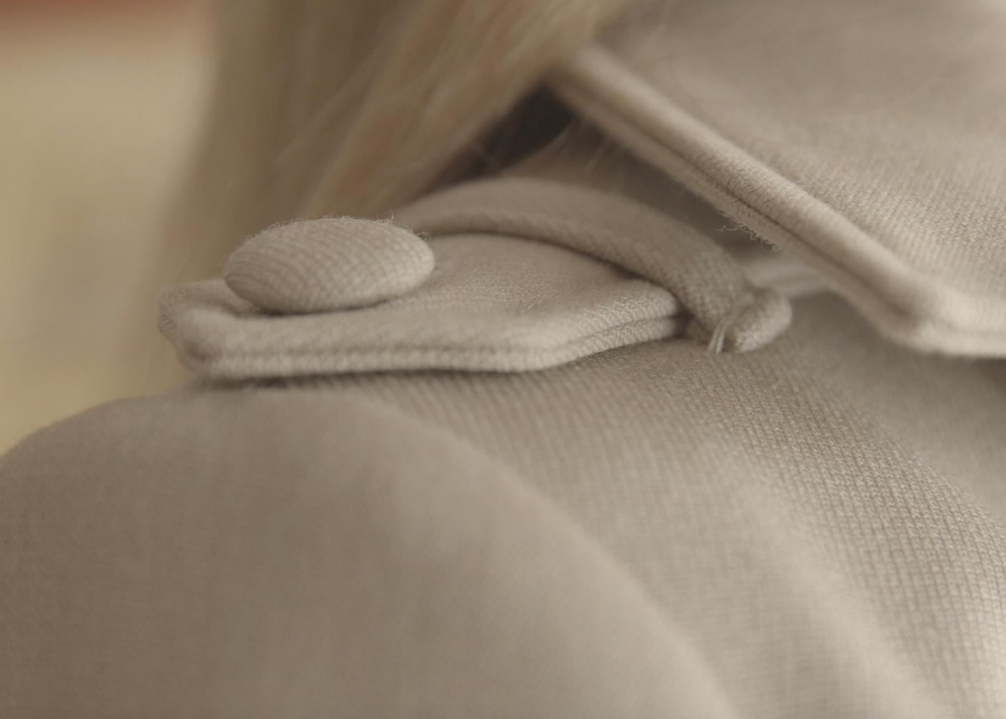 Beige short wool trench coat for women Sculpted Grace by Gorina Atelier front detailed view with model